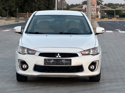 Mitsubishi Lancer MODEL 2016 GCC CAR PERFECT CONDITION INSIDE AND OUTSIDE
