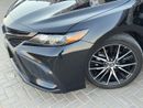 تويوتا كامري SE 2.5L (204 HP) SE / 2.5L V4 / SUNROOF / RADAR / KEYLESS ENTRY / ECO MODE / BLIND SPOTS