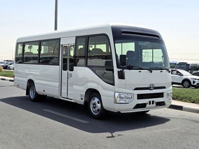 تويوتا كوستر TOYOTA COASTER PETROL 2.7 MT - AUTO DOOR - 23 SEATER - 2025 MODEL - WHITE -